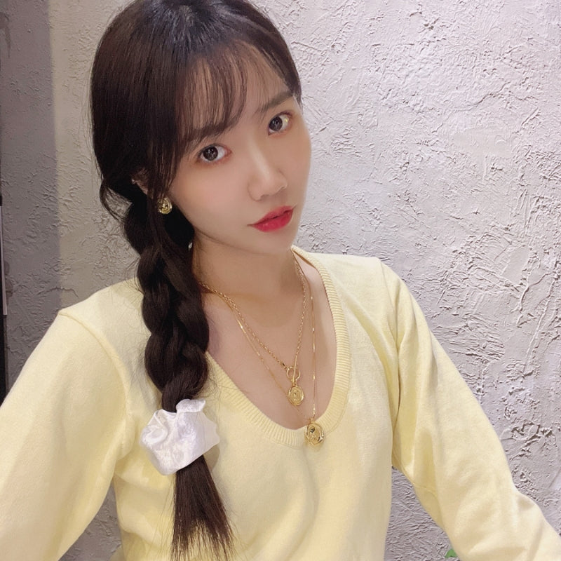 女王像コインツイストネック