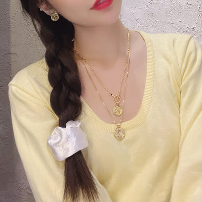 女王像コインツイストネック